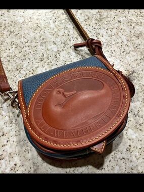 Dooney & Bourke Navy Pebbled Leather Crossbody with Brown Leather Flap